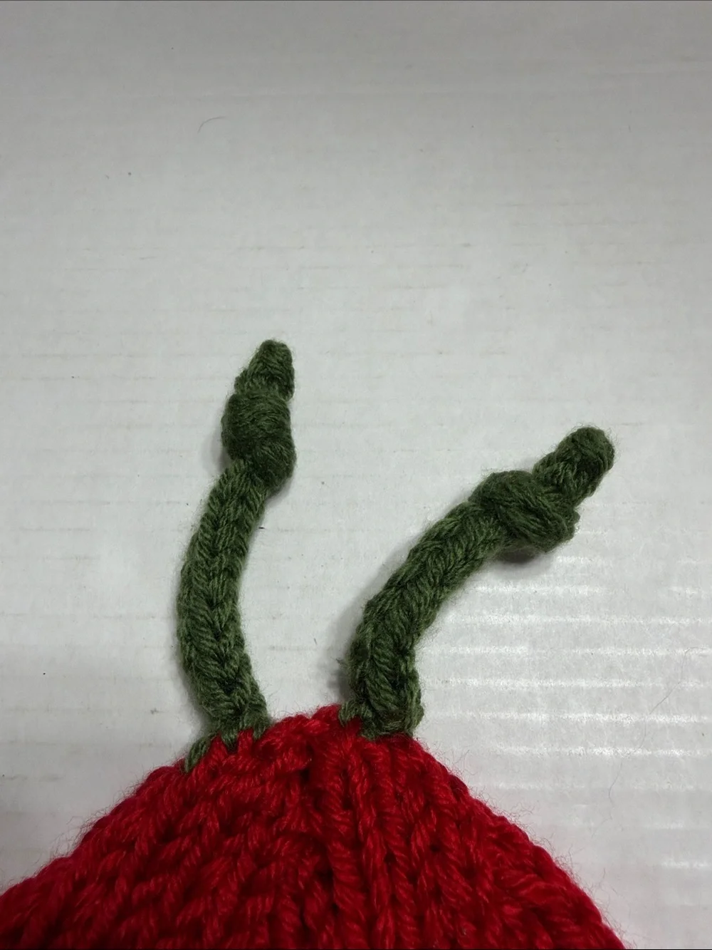 Red Knit Kids Beanie with Yellow Eye Detail and Green Antennae